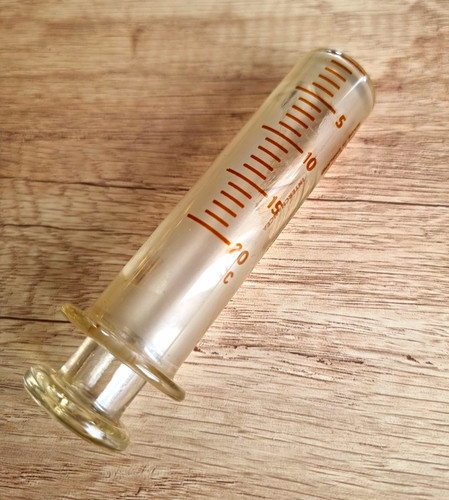 Vintage glass syringe with - , red