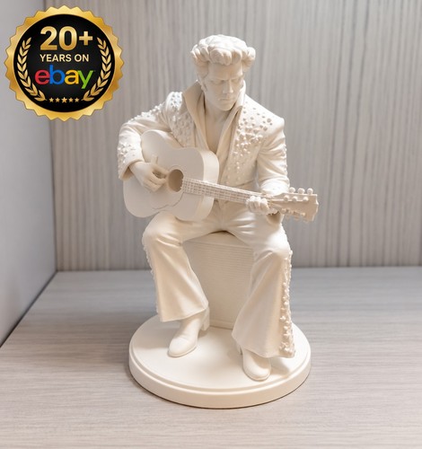 Elvis guitar statue sitting - guitar,