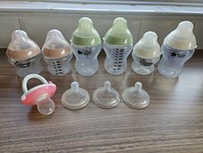 Tommie Tippie Bottles X 6 And A Munchkin Baby Feeder. Comes With Teats & Spares