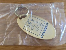 Gold Peugeot Keyring Plated