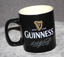 NEW OLD STOCK GUINNESS MUG BLACK AND CREAM COLOUR