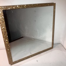Decorative Mirror Featuring A