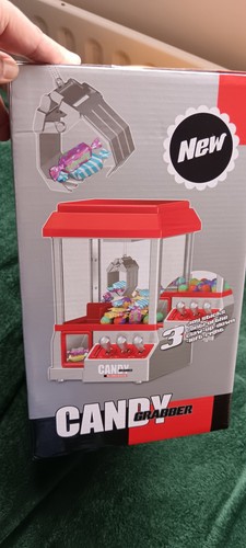 Red claw machine arcade game - claw,