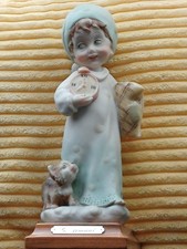 G. Armani Figurine. Small child with nightgown/nightcap/pillow and dog. Unusual.