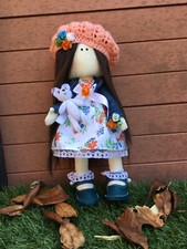 Tilda doll holding handmade micro teddy