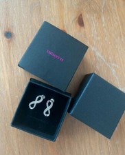 Infinity Earrings.                     H. SAMUEL 