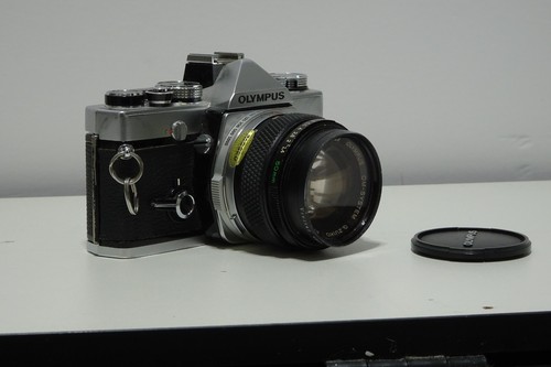 Vtg olympus 35mm slr film - om-1,