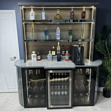 Curvature Grey Wall Bar with Matt Concrete Quartz Worktop and Smoke Grey Mirror