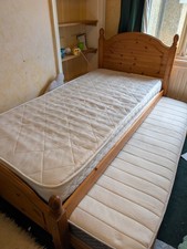 Single trundle bed with mattresses included (if needed) 