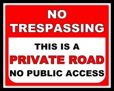 NO TRESPASSING PRIVATE ROAD NO