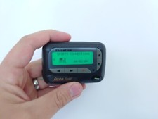 Unication Alpha Gold / Motorola Advisor Elite pager beeper collectors movie prop