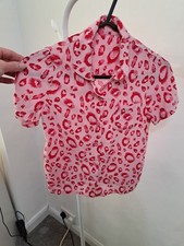 Pink/red Patterned PJ Top. Age
