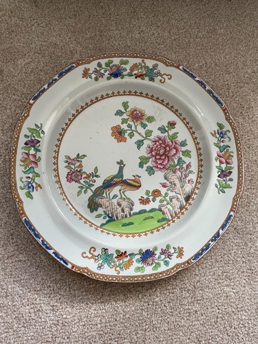 Decorative plate with peacocks