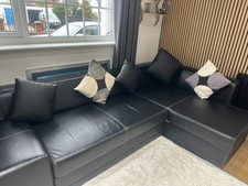 BLACK FAUX LEATHER CORNER SOFA BED