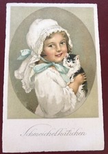 Beautiful Little Girl With Her Kitten