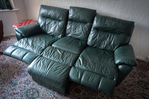 Large green leather recliner