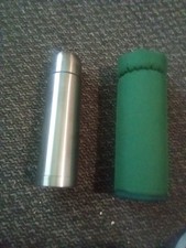 Flask With Insulating Cover
