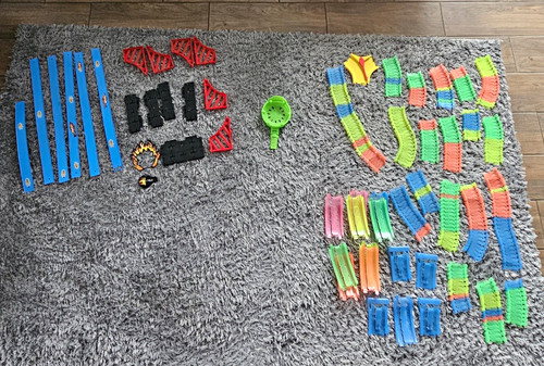 Mixed brand toy racing tracks.