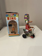 VINTAGE DUCK ON A BIKE TIN