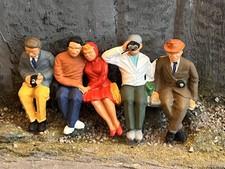 Painted Seated Spectators -