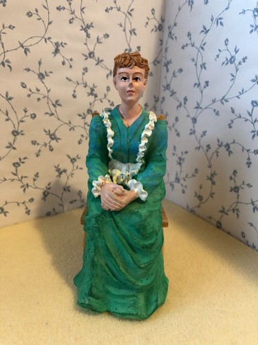 Dolls house sitting - dolls,