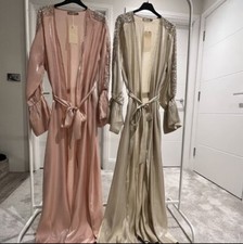 Elegant overcoat/abaya. 
