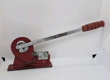 Metal Hand Guillotine and Hole Punch, bench mountable.