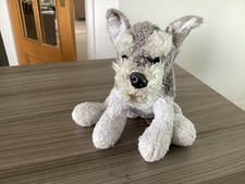 Suki Schnauzer Soft Grey and White small sitting dog