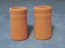 Two Small Round Chimney Pots