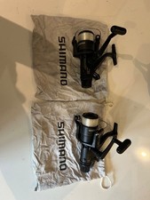 Pair of Shimano Baitrunner Aero 5010 Fishing Reels with original bags