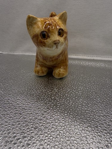 Winstanley ginger cat standing - winstanley,