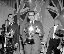 Chris Brasher receives