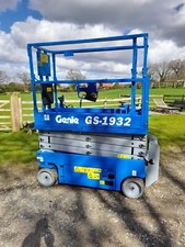 cherry picker access platform scissor lift genie skyjack
