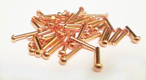 2 copper rivets - x,
