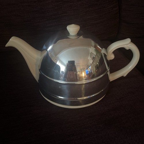 China teapot with metal - teapot,
