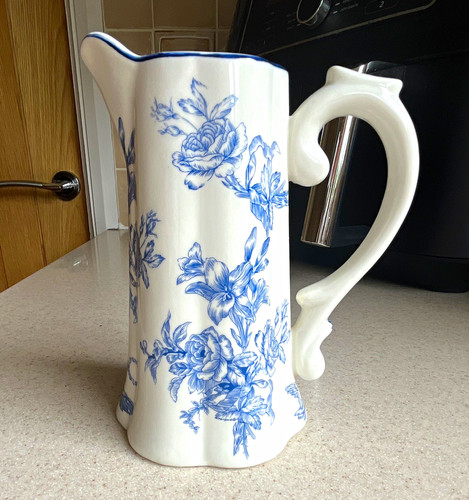 White blue floral ceramic - &,