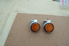 SUZUKI TS90, TS100, TS125  FRONT REFLECTORS AND BRACKETS   NOS