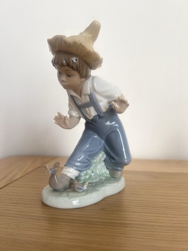 Nao lladro figurine - by,