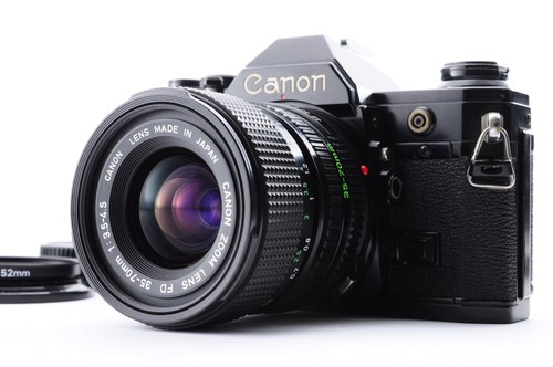 Canon black zoom - /,