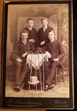 Man & 3 Young Men with Hat