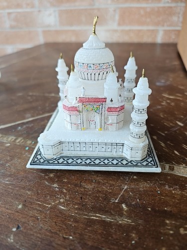 Cut and carved white - and, marble