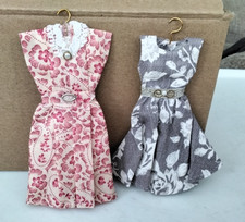 Dolls house dresses hangers - house,