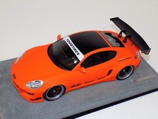 1/18 AB Models Porsche Cayman Rocket Bunny Matte Orange on Alcantara Base