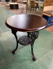 Cast iron pub table with 'lady