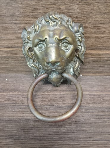 Brass lion head door knocker - head,