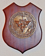 French Mission Militaire de Cooperation tape de bouche plaque cast metal & wood