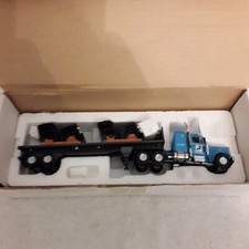 Matchbox Collectibles 1:58 Scale Peterbilt Tractor & Trailer with Cab Load
