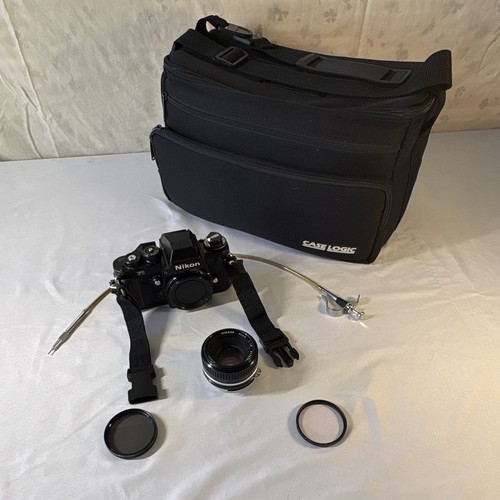 Nikon black 35mm slr - nikon,