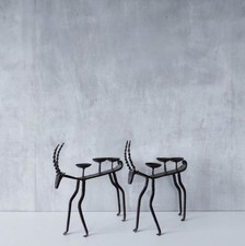 Pair of brutalist vintage wrought iron primitive antelope deer candelabras