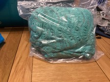 green ladies mermaid blanket brand new and comes with carrying bag.